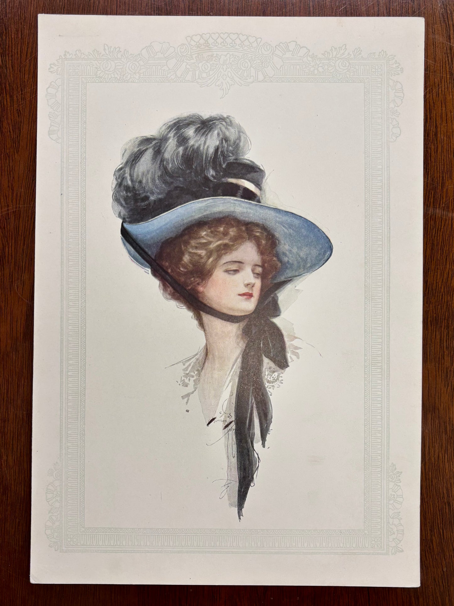 Girl with Blue and Black Feathered Hat by Harrison Fisher